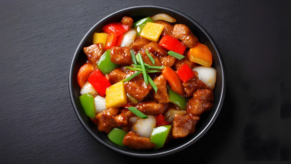 Friteerattu hapanimeläkastikkeessa (katkarapu)